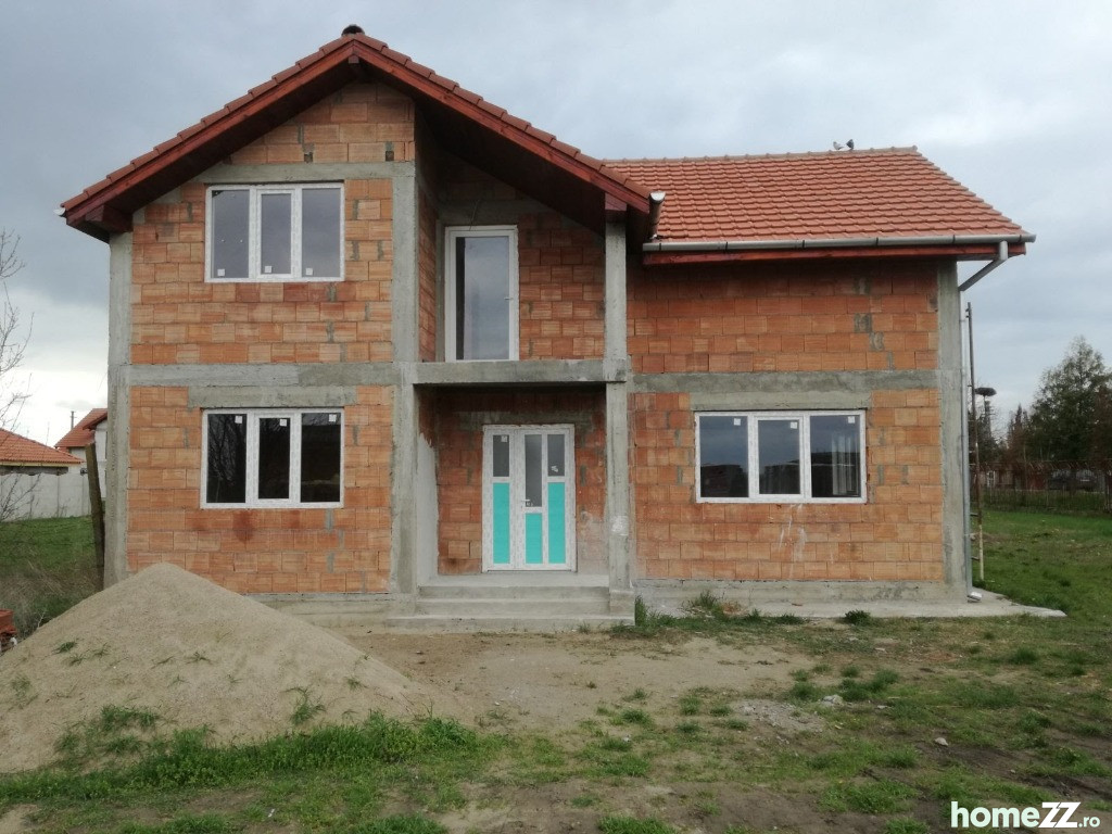 Vila individuala noua + teren 720 mp Dinias Timis Central