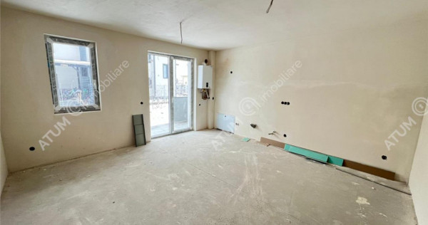 Garsoniera intabulata decomandata si loc parcare in Talmaciu