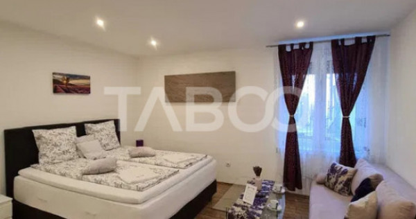 Garsoniera moderna 32mpu de vanzare in centrul istoric al Si