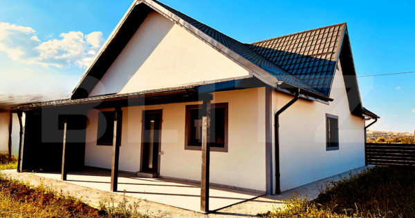 Casa plan parter de vanzare, cu 4 camere, 110 mp utili, zona