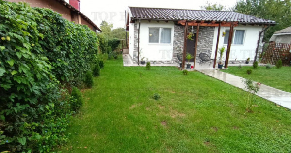 Super casa pe parter plus curte, pozitionata la strada in Do