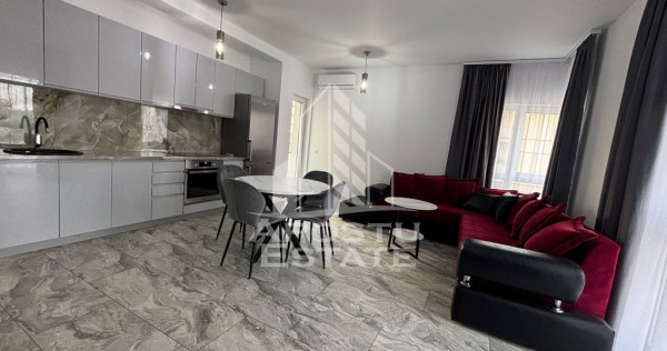 Apartament cu 2 camere, loc de parcare, prima inchiriere,...