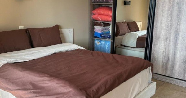 Garsoniera Zona Titan