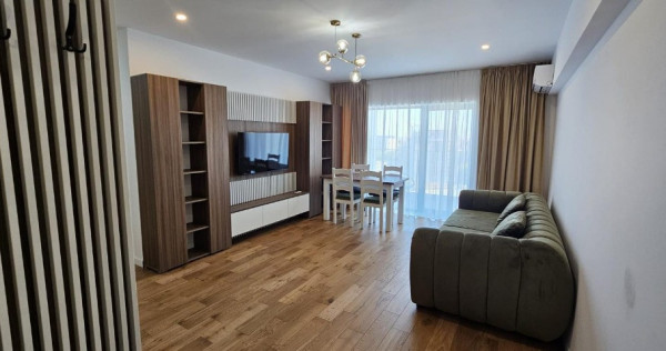 2 camere complet mobilat/utilat, prima chirie Loc parcare inclus