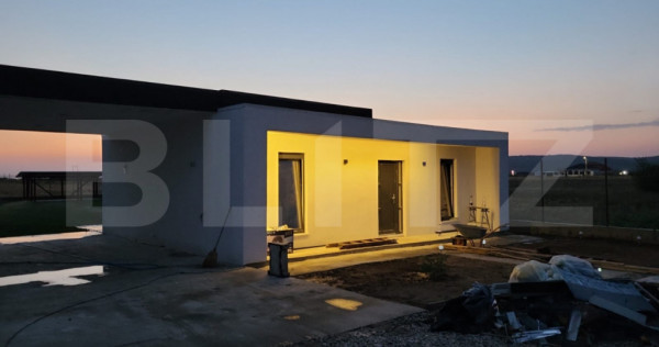 Casa individuala Osorhei cu filigorie si gard imprejmuire