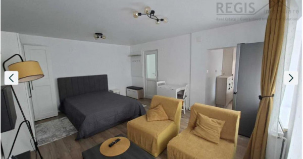 Garsoniera la casa Schei renovata cu curte Petfriendly