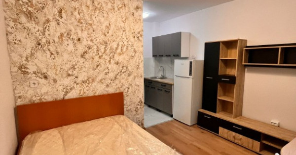 Camera de camin tip garsoniera,cu baie proprie,et2,renovata,cu chirias