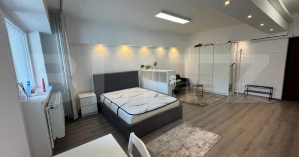 Garsoniera de inchiriat, 38 mp, open space, centrala proprie