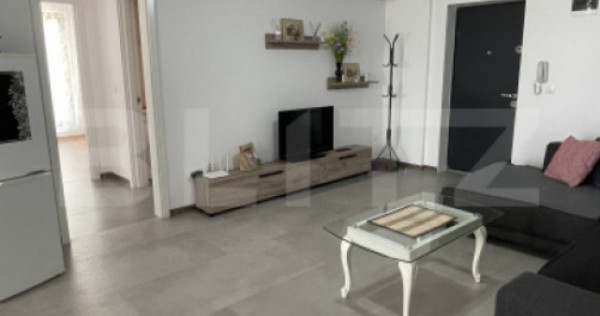 Apartament bloc nou, 72 mp, 2 dormitoare si living, parter,