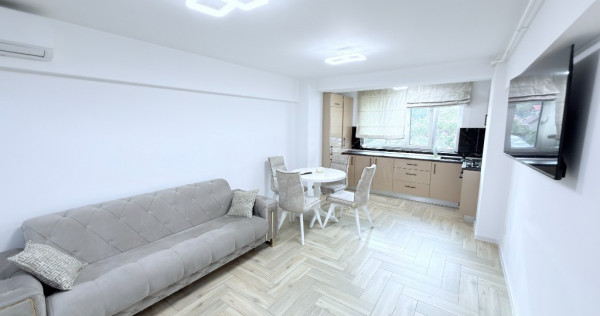 Apartament ultracentral mobilat si utilat cu parcare proprietate
