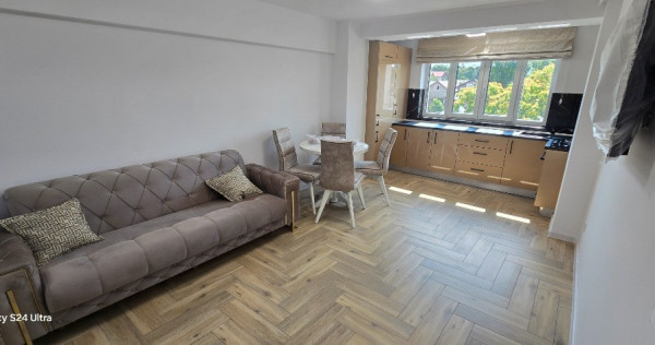 Apartament ultracentral mobilat si utilat cu parcare proprietate