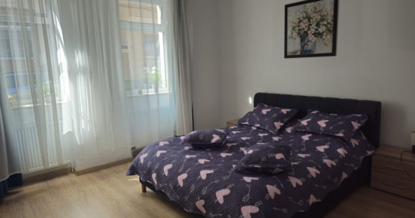 Apartament cu 2 camere, 55mp, la curte comuna, in zona Centr