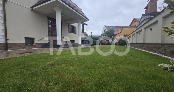 Casa individuala cu 10 camere si 530mp curte libera in zona