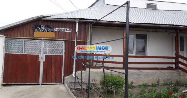 Teren intravilan 1000 mp.,cu casa batraneasca, toate utilita