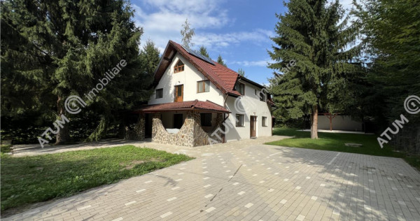 Cabana cu 7 camere 7 bai si teren 1000 mp in Avrig zona Mlac