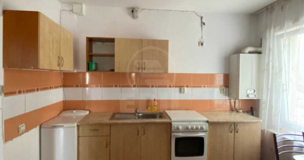 Apartament 2 camere,etaj 1,decomandat,zona Florilor