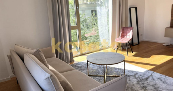 Apartament cu 2 camere, terasă și vedere spre grădină...