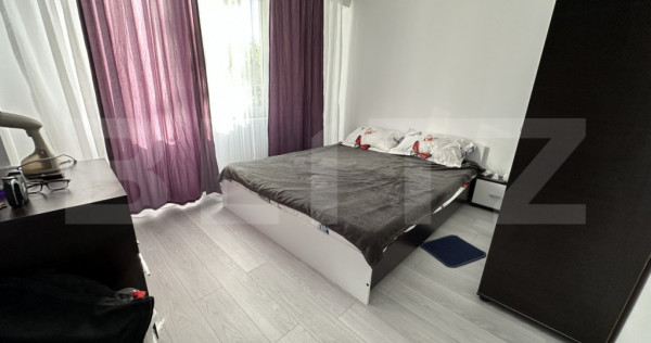 Apartament cu 3 camere, decomandat, cu 2 bai, 70 mp,