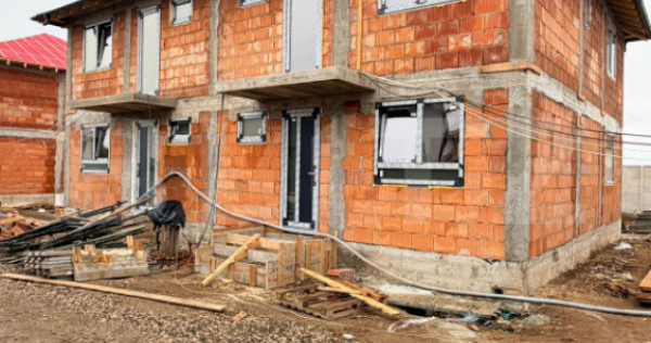 Casă nouă cu 3 dormitoare, 2 băi și teren de 220 mp