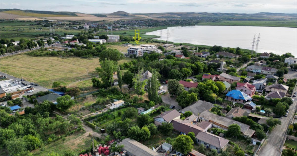 Teren intravilan construibil cu deschidere la lac
