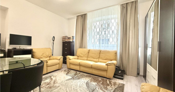 Proprietate cu potential turistic | 2 Garsoniere in Centrul