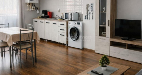 Apartament mobilat BLOC NOU, etaj intermediar, incalzire in