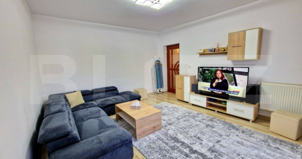 Apartament cu 2 dormitoare, balcon inchis, parter inalt, par