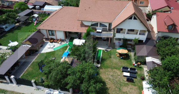 Casa 8 camere,teren 1027 mp, foisor si gratar,Micesti
