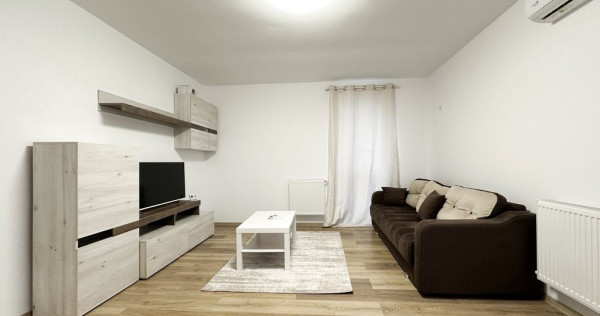 Apartament retras, cu centrala si parcare