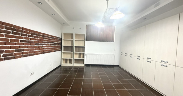 Apartament cu 2 camere + 47 mp teren in proprietate in Centr