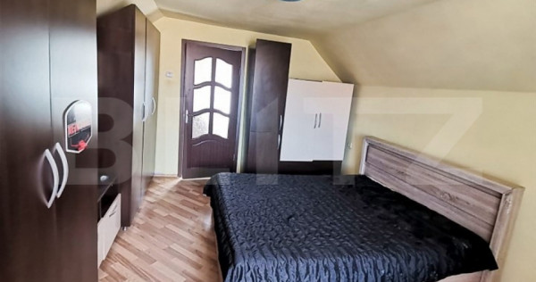 Casa cu 4 camere si curte cu 2 locuri de parcare, zona Iris