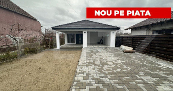 Casă cu 3 camere 130 mp, 1 bucătărie, 1 living, 2 băi, 1