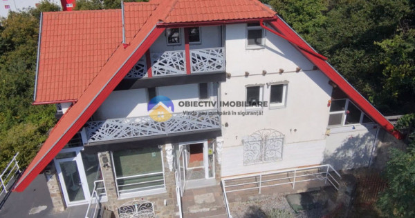 Casă modernă + Tesla Model S – ofertă unică în Piatra