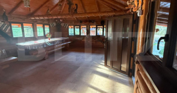 Cabana din lemn rotund, 2 camere, 140 mp, teren 2800 mp, Pal