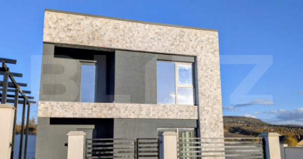 Casa moderna situata intr-o zona linistita, cu acces facil l