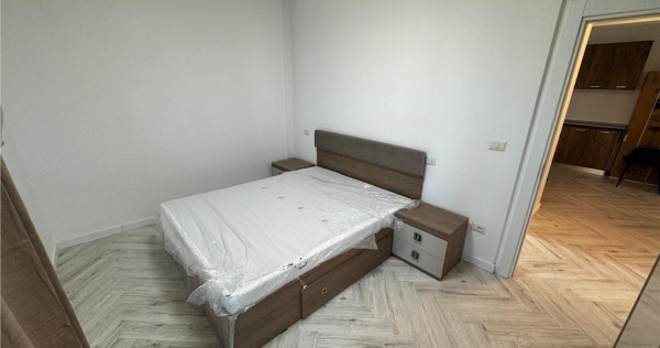 Ap 2 cam,parter,parcare, bloc nou, Scoala 2 - Piata Moldovei