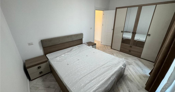 Ap 2 cam,parter,parcare, bloc nou, Scoala 2 - Piata Moldovei
