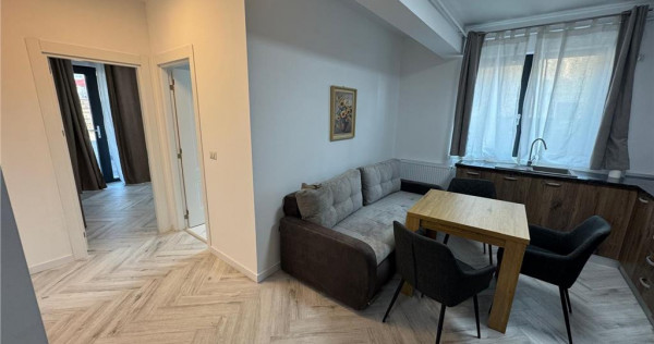 Ap 2 cam,parter,parcare, bloc nou, Scoala 2 - Piata Moldovei