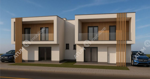 Casa de 4 camere decomandate cu 2 bai si teren de 200 mp in