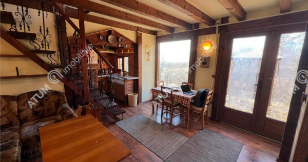 Cabana cu teren de 640 mp cu PUZ aprobat situata in Tropinii