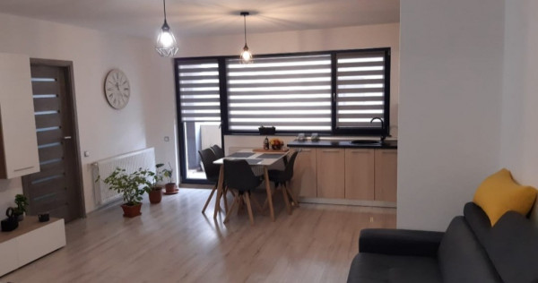 Apartament 2 camere spatios 58 mp,etaj 1, parcare privata Floresti