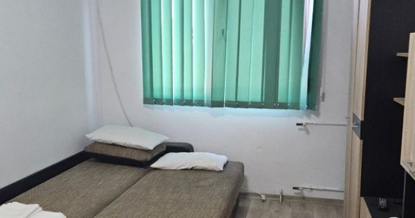 Doua camere in zona sediu politie.