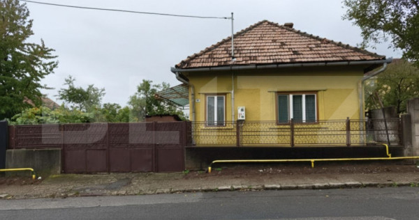 Casa individuala cu 2 camere, 740 mp teren, B dul Revolutiei