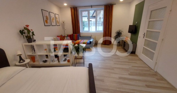 Garsoniera de vanzare 43 mpu pivnita zona Orasul de Jos Sibi