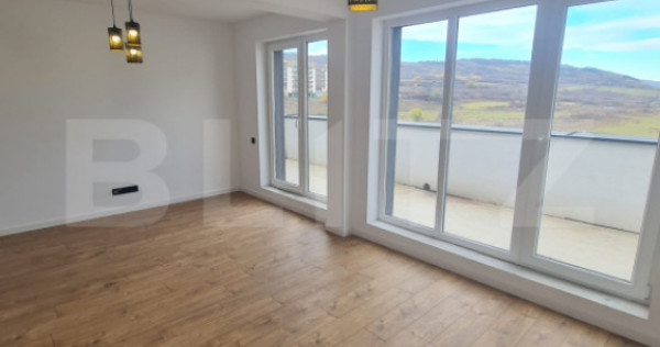 Apartament finisat, 52 mp utili, terasa 34 mp, zona Terra