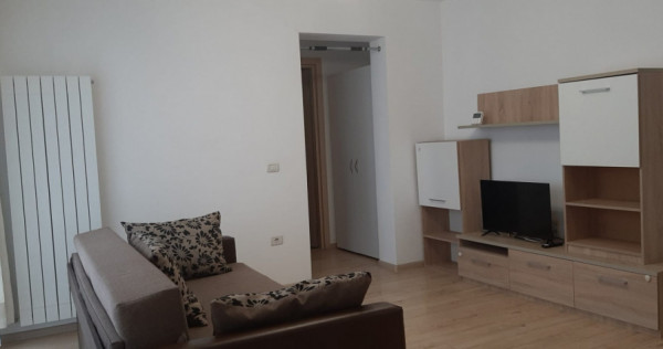 Studio 58 mp, etaj intermediar, cu loc de parcare inclus, si