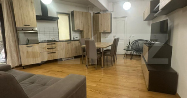 Apartament cu 3 camere de 70 mp și terasă la parter, zona