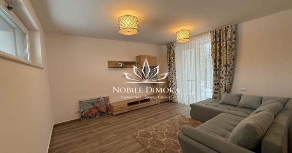 Casa moderna cu 4 camere, 2 bai, terasa si gradina de 50m...