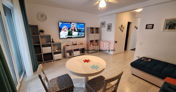 Casă &icirc;nșiruită P+1+M - 4 camere - 2 terase - curte