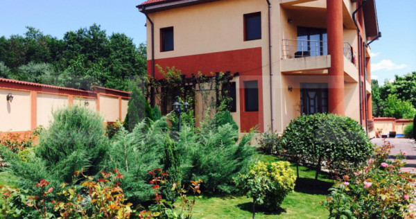 Casa P+1+M cu piscina si 1057 mp de teren, pozitionata inedi